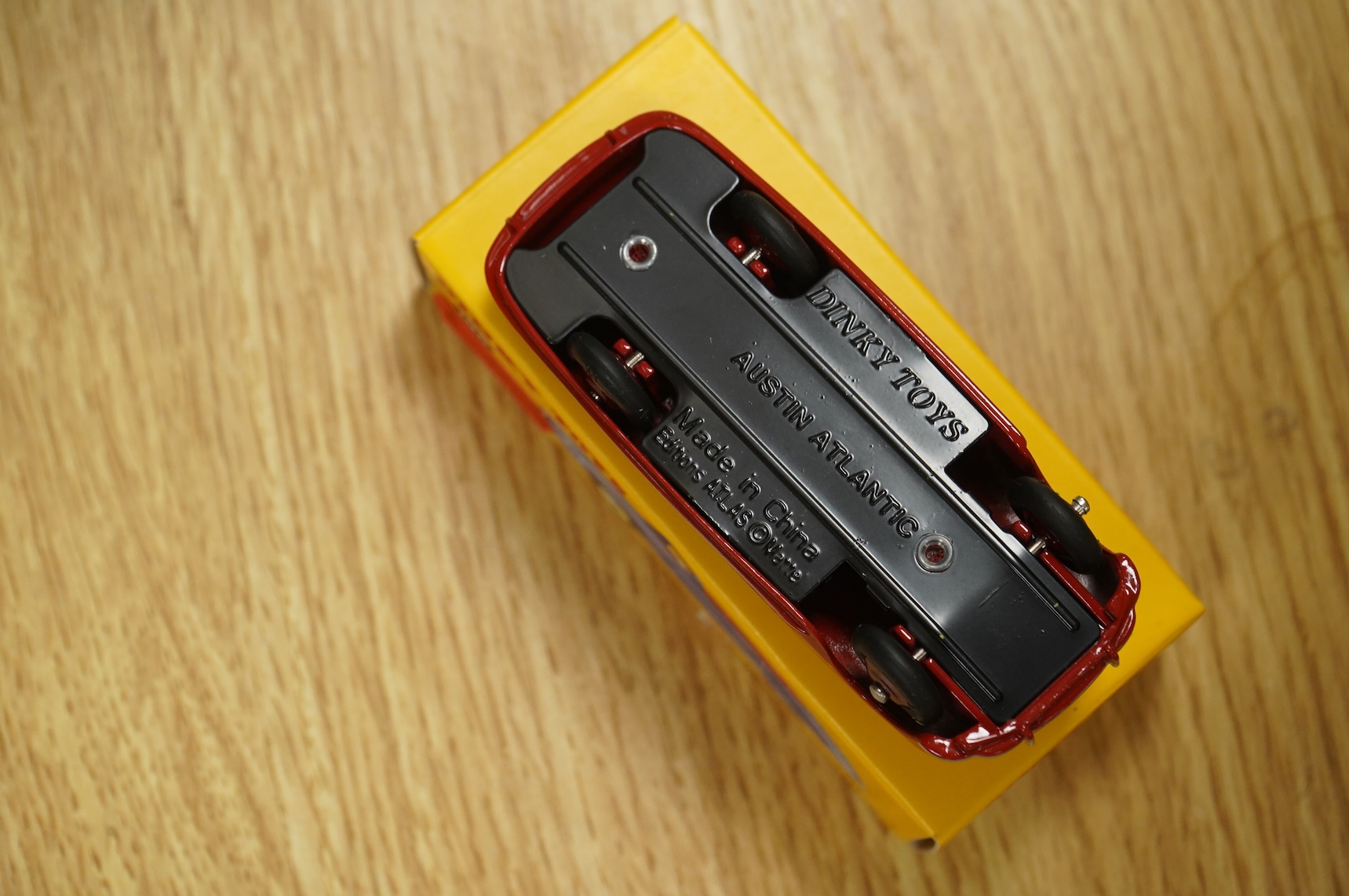 Twenty-two boxed Atlas Dinky Toys, including cars and commercial vehicles, Leyland tankers, a Foden wagon, sports cars, etc.